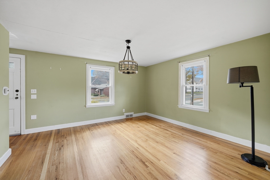 803 Armory Street Springfield, MA 01107 - Photo 18 of 34 a view of livingroom with hardwood floor and hallway