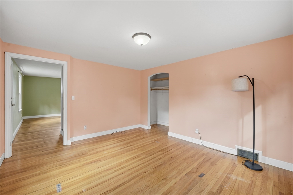 803 Armory Street Springfield, MA 01107 - Photo 20 of 34 a view of an empty room with wooden floor