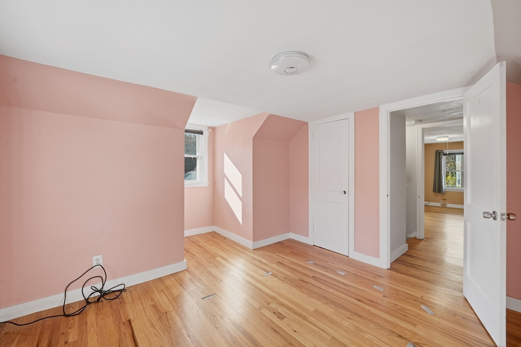 803 Armory Street Springfield, MA 01107 - Photo 27 of 34 wooden floor in an empty room