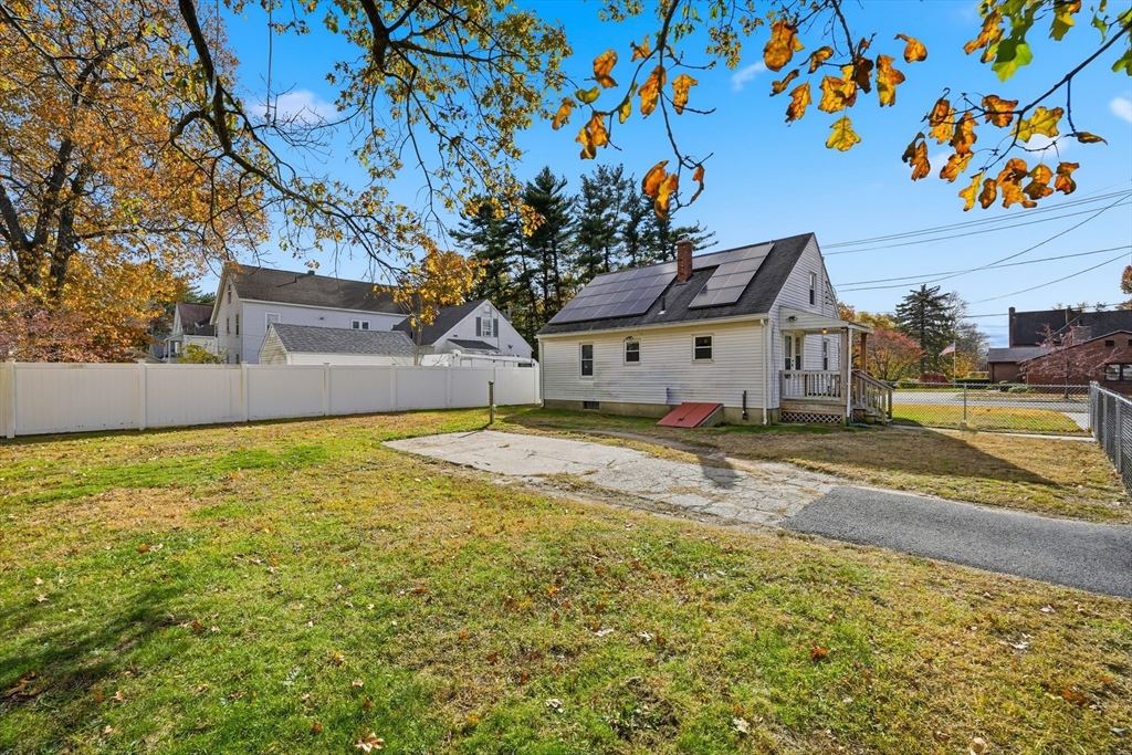 803 Armory Street Springfield, MA 01107 - Photo 8 of 34 a house view with swimming pool in front of it