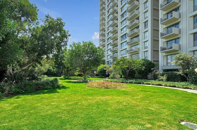 a view of a building with a yard