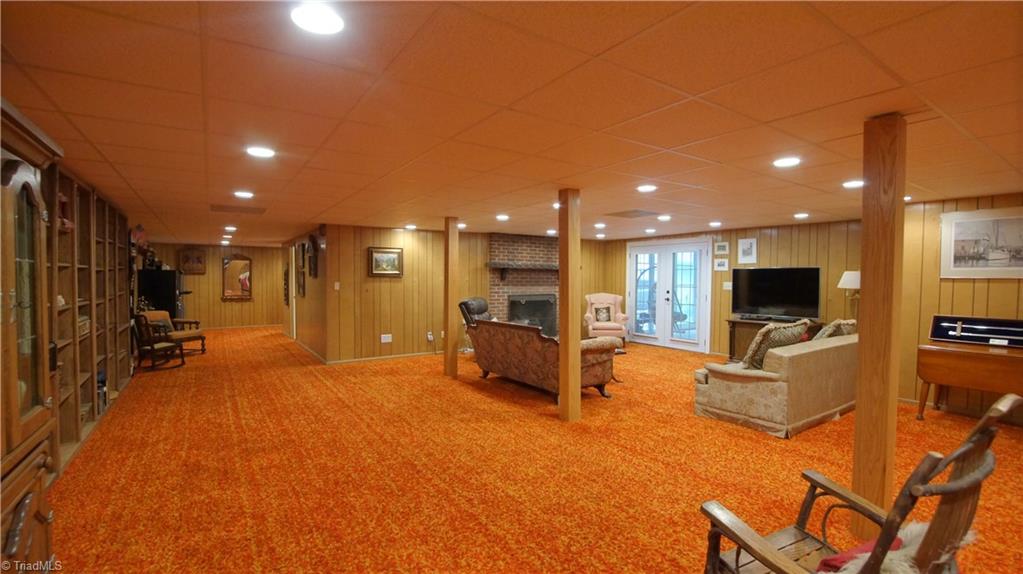 2840 St George Road Winston-Salem, NC 27106 - Photo 23 of 30 Very large Basement Great Room and walkout to Screened porch!