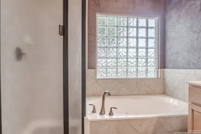 a view of a small space with wooden floor and closet