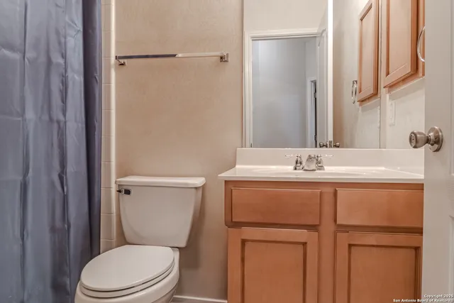 a view of a two chairs in the porch