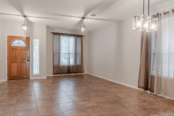 a view of a bathroom with a shower and a sink