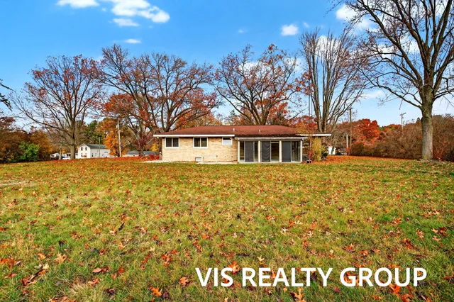 $425,000 | 15746 Pruin Street, Spring Lake, MI 49456