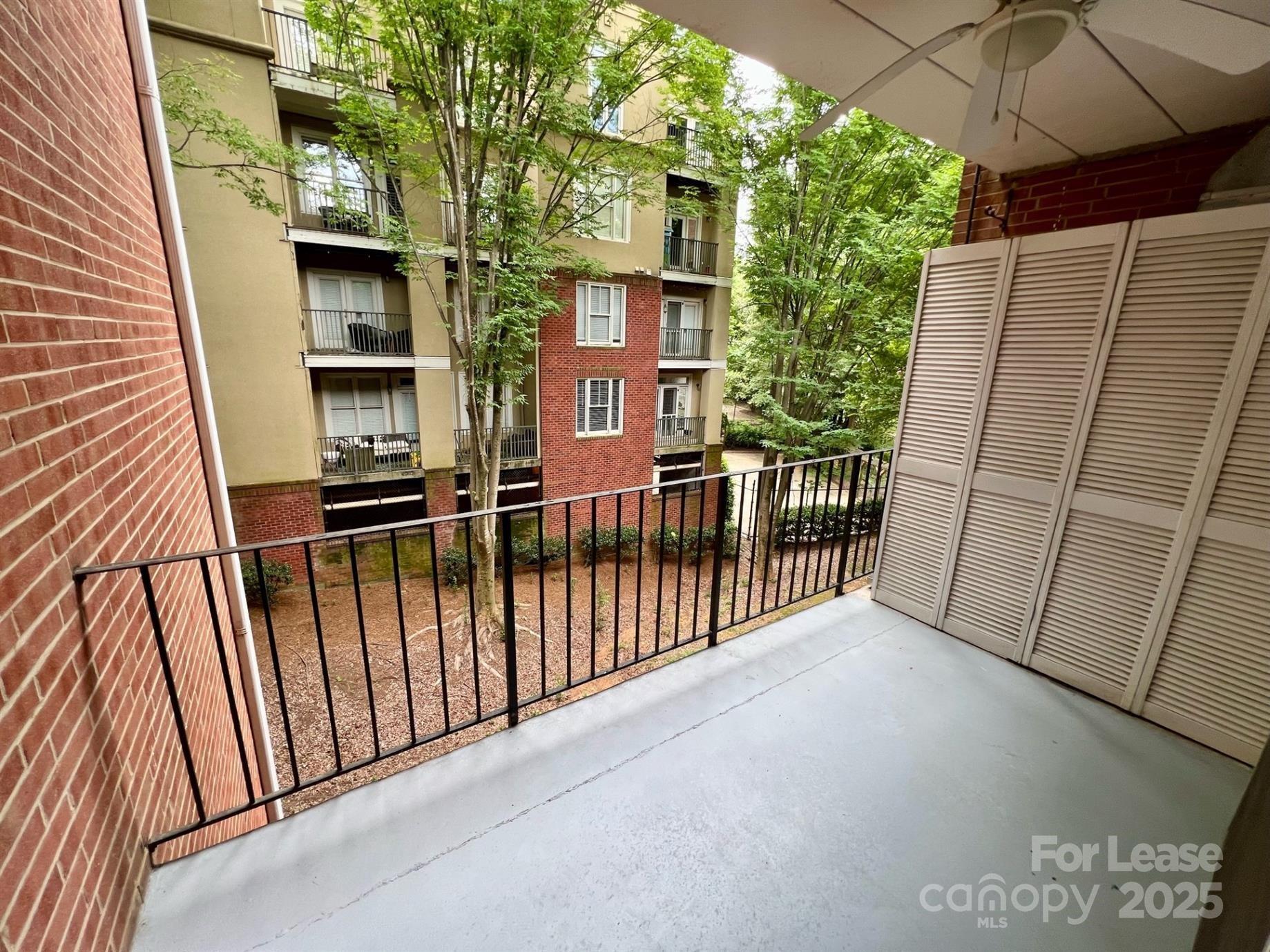 400 Queens Road, Unit B4 Charlotte, NC 28207 - Photo 3 of 10 a view of a balcony with an outdoor space