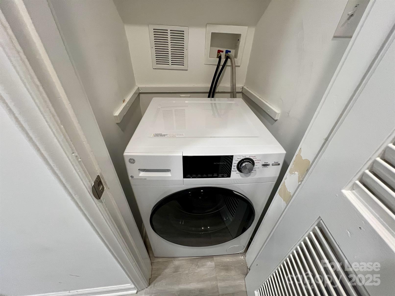 400 Queens Road, Unit B4 Charlotte, NC 28207 - Photo 9 of 10 a utility room with dryer and washer