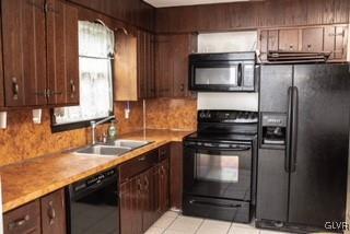 2825 Middletown Road Bethlehem, PA 18020 - Photo 21 of 28 a kitchen with a sink stove and microwave
