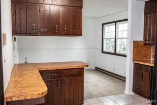 2825 Middletown Road Bethlehem, PA 18020 - Photo 22 of 28 a view of washer and dryer with wooden cabinets