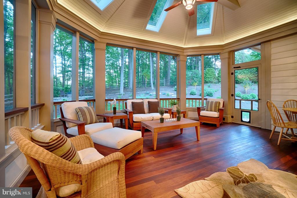 1301 Sawbridge Way Reston, VA 20194 - Photo 14 of 30 a living room with furniture and a large window
