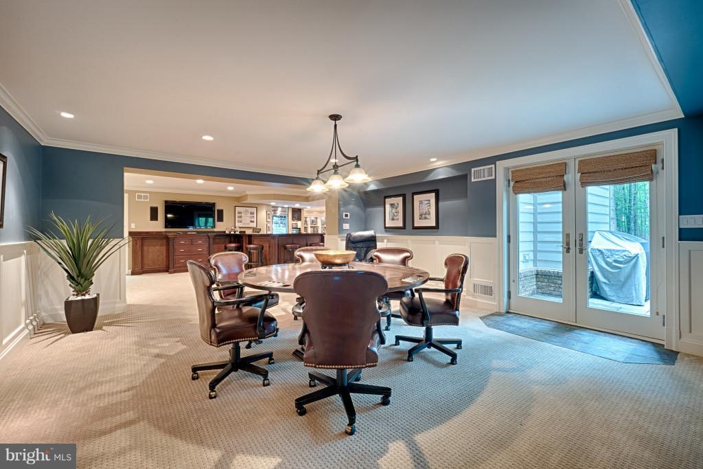 1301 Sawbridge Way Reston, VA 20194 - Photo 25 of 30 a view of a livingroom with workspace and a window