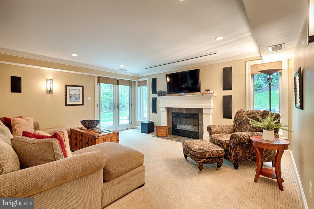 1301 Sawbridge Way Reston, VA 20194 - Photo 26 of 30 a living room with furniture and a fireplace