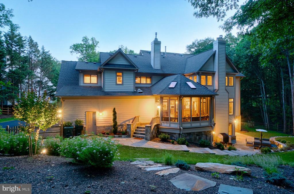 1301 Sawbridge Way Reston, VA 20194 - Photo 30 of 30 a front view of a house with patio