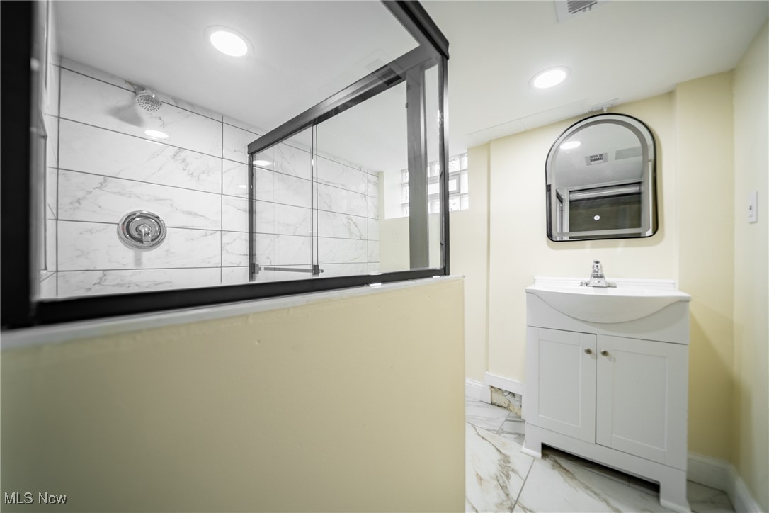 3816 Summit Park Road Cleveland Heights, OH 44121 - Photo 26 of 35 Full bath featuring light marble finish floors, vanity, a stall shower, and recessed lighting