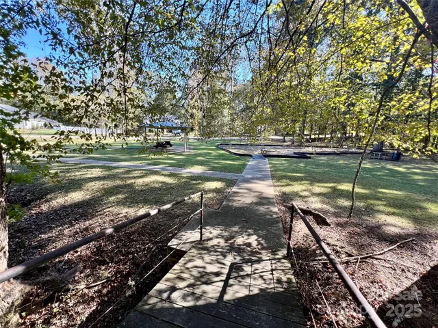 a view of a lake with a house
