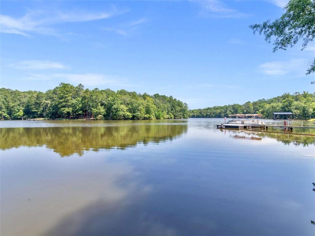 1775 Long Piney Road Mansfield, GA 30055 - Photo 26 of 26 a view of a lake with houses in the background