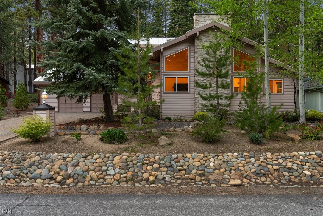 1094 Mill Creek Road Incline Village, NV 89451 - Photo 1 of 32 front view of a house with a yard