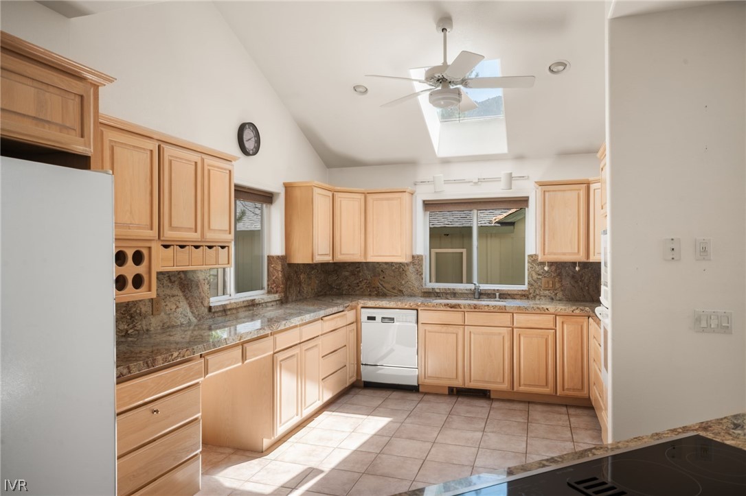 1094 Mill Creek Road Incline Village, NV 89451 - Photo 14 of 32 a kitchen with stainless steel appliances granite countertop a sink and cabinets