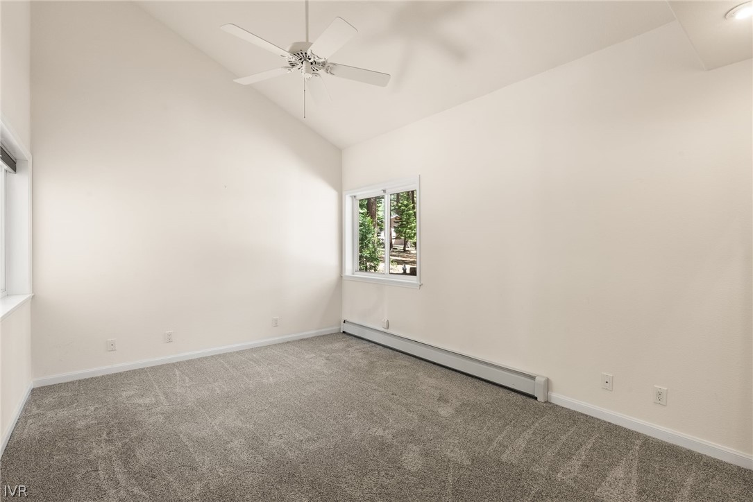 1094 Mill Creek Road Incline Village, NV 89451 - Photo 25 of 32 an empty room with a window and ceiling fan