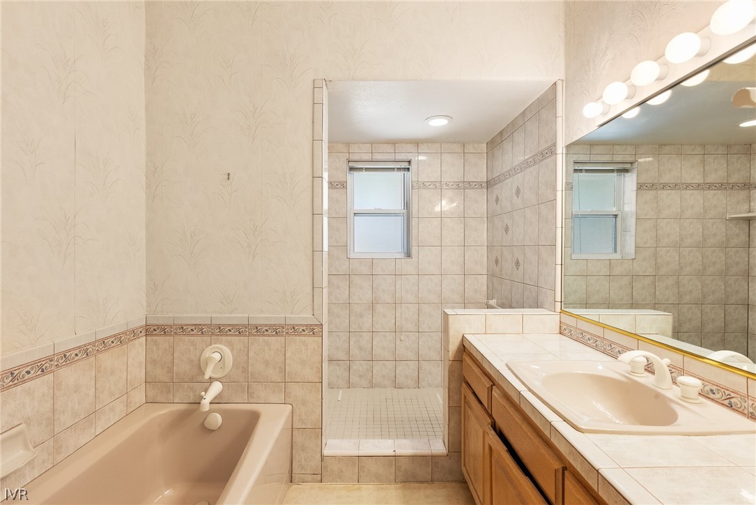 1094 Mill Creek Road Incline Village, NV 89451 - Photo 26 of 32 a bathroom with a tub sink and mirror