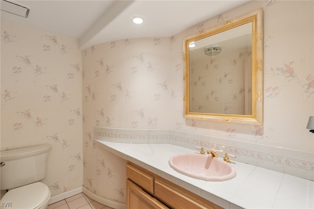1094 Mill Creek Road Incline Village, NV 89451 - Photo 27 of 32 a bathroom with a sink and a mirror