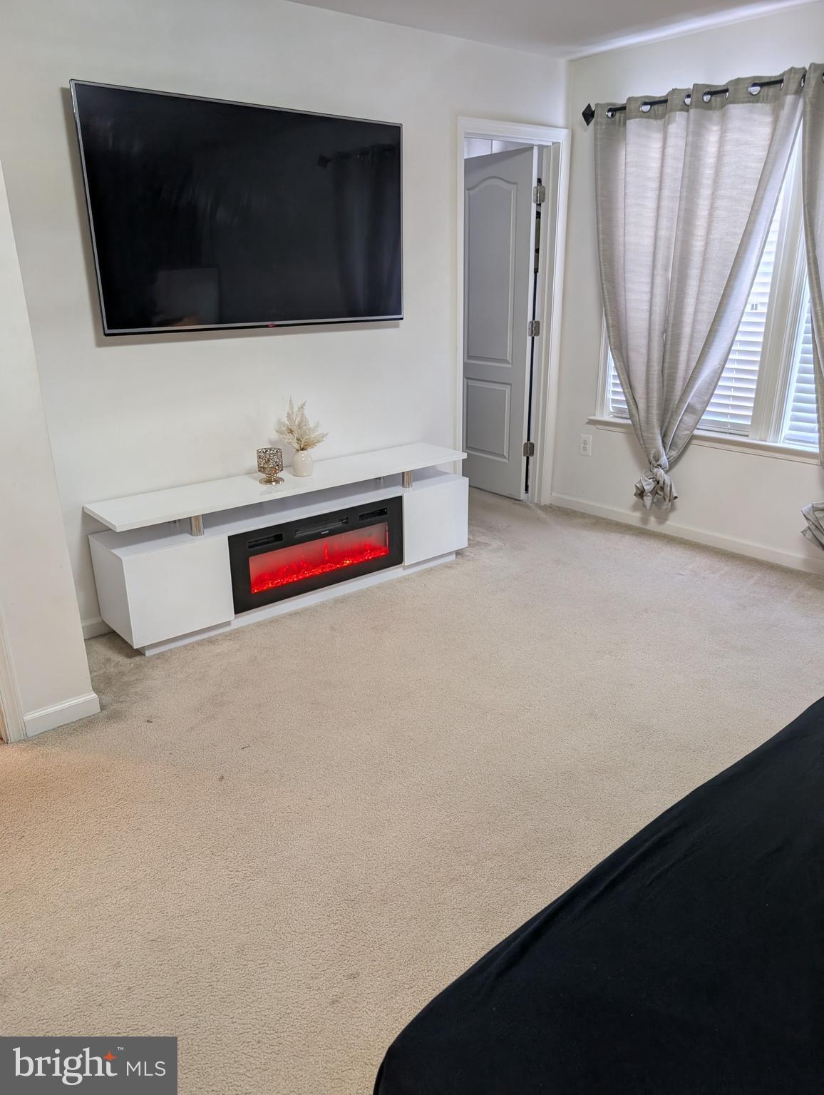 13944 Seneca Ridge Drive Hagerstown, MD 21740 - Photo 12 of 27 view of living room with furniture and a flat screen tv