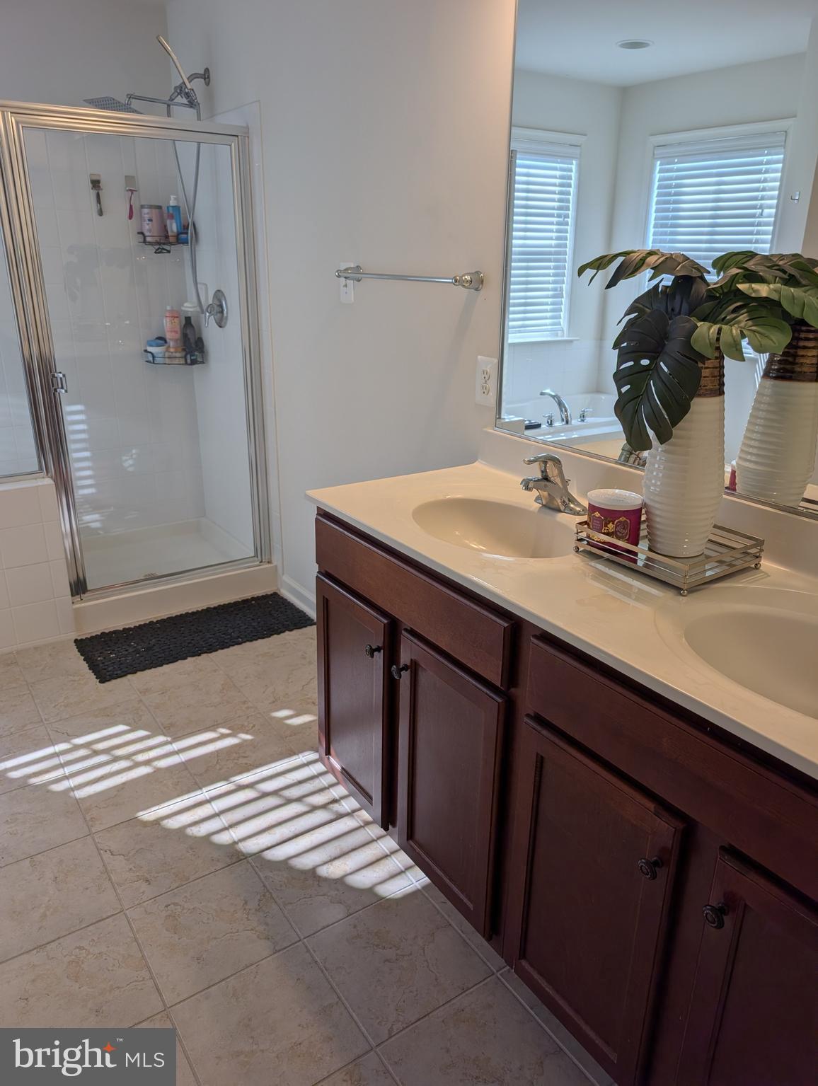 13944 Seneca Ridge Drive Hagerstown, MD 21740 - Photo 15 of 27 a bathroom with a sink and a mirror