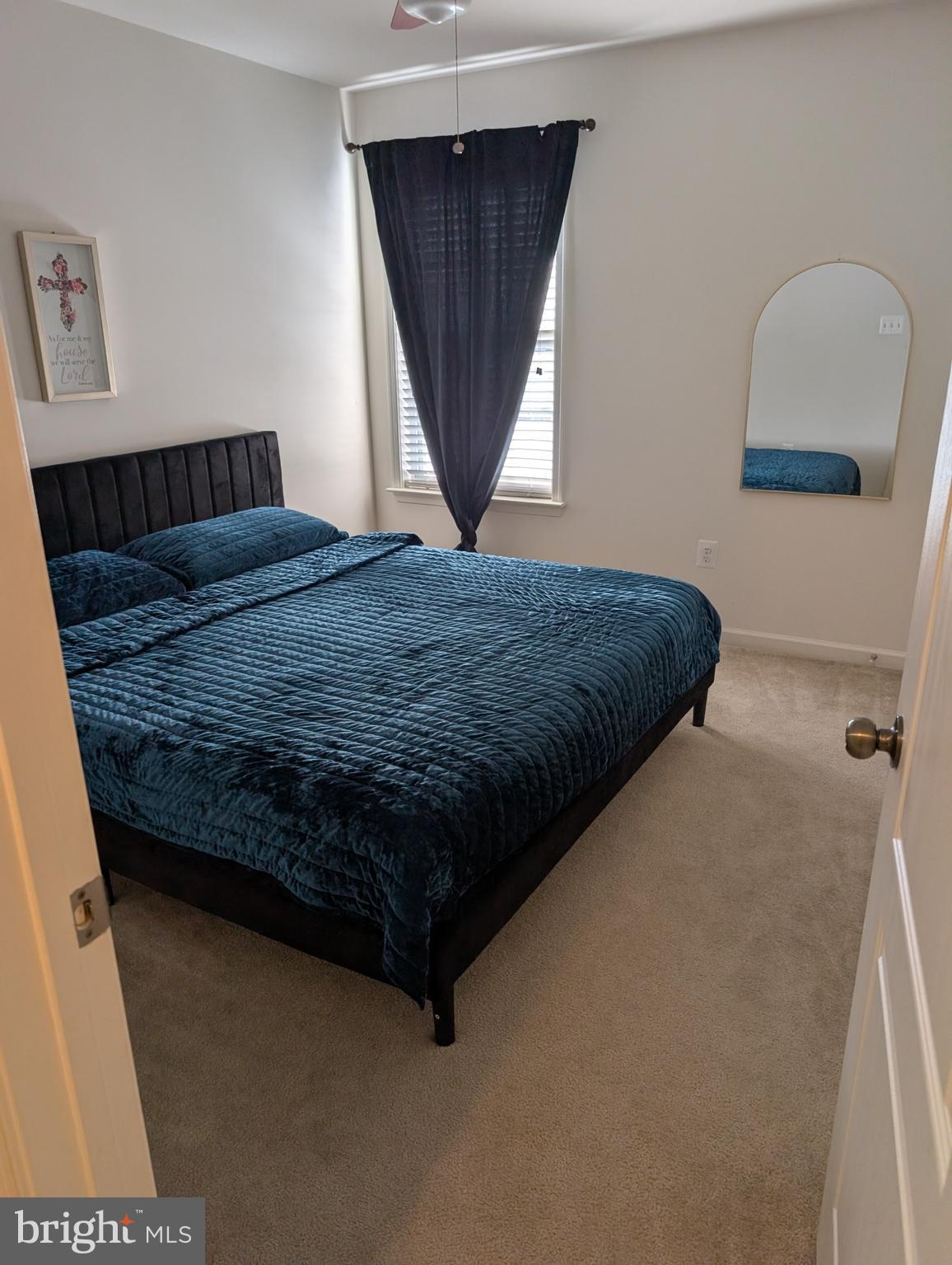 13944 Seneca Ridge Drive Hagerstown, MD 21740 - Photo 19 of 27 a bedroom with a bed window and mirror