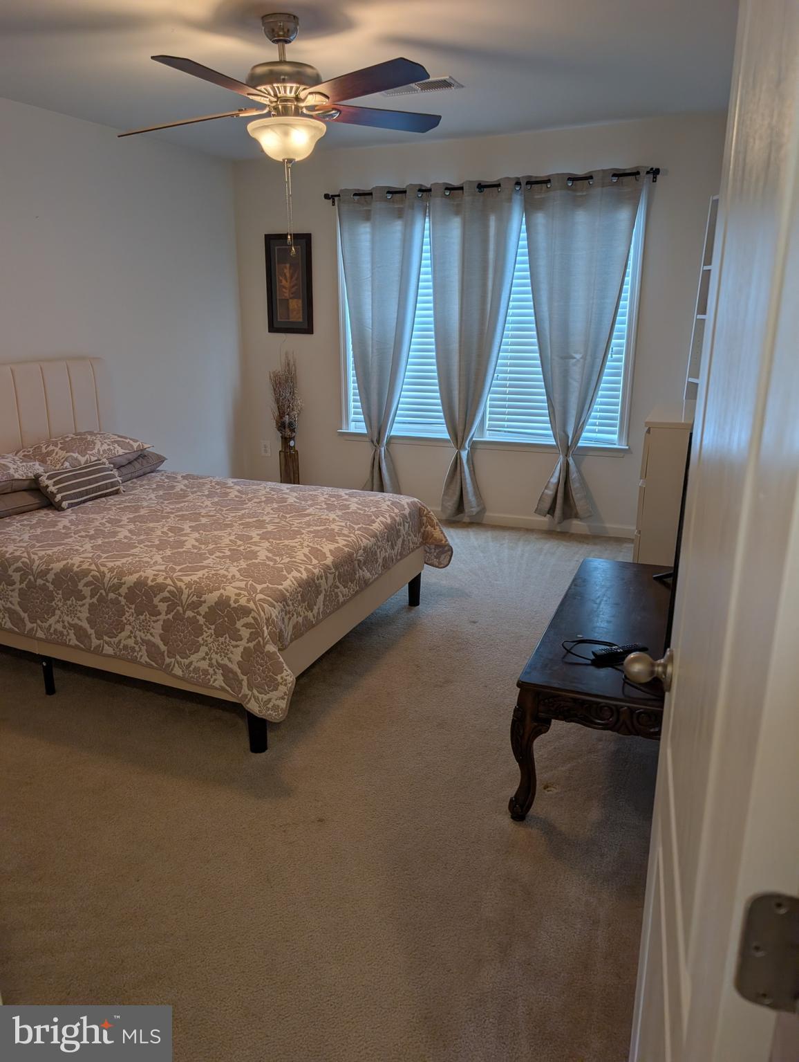 13944 Seneca Ridge Drive Hagerstown, MD 21740 - Photo 20 of 27 a bedroom with a bed and a window