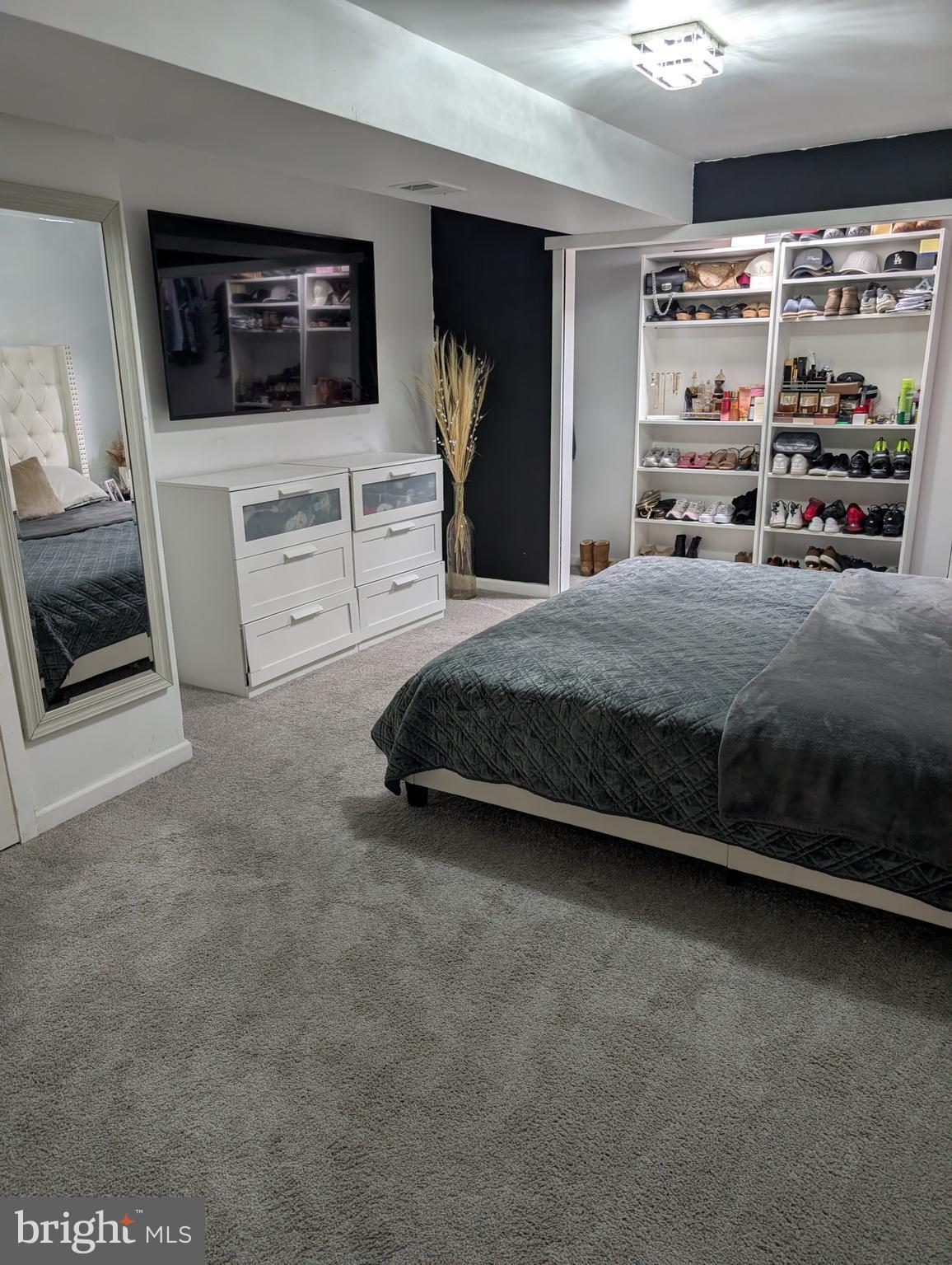 13944 Seneca Ridge Drive Hagerstown, MD 21740 - Photo 25 of 27 a bedroom with furniture and a flat screen tv