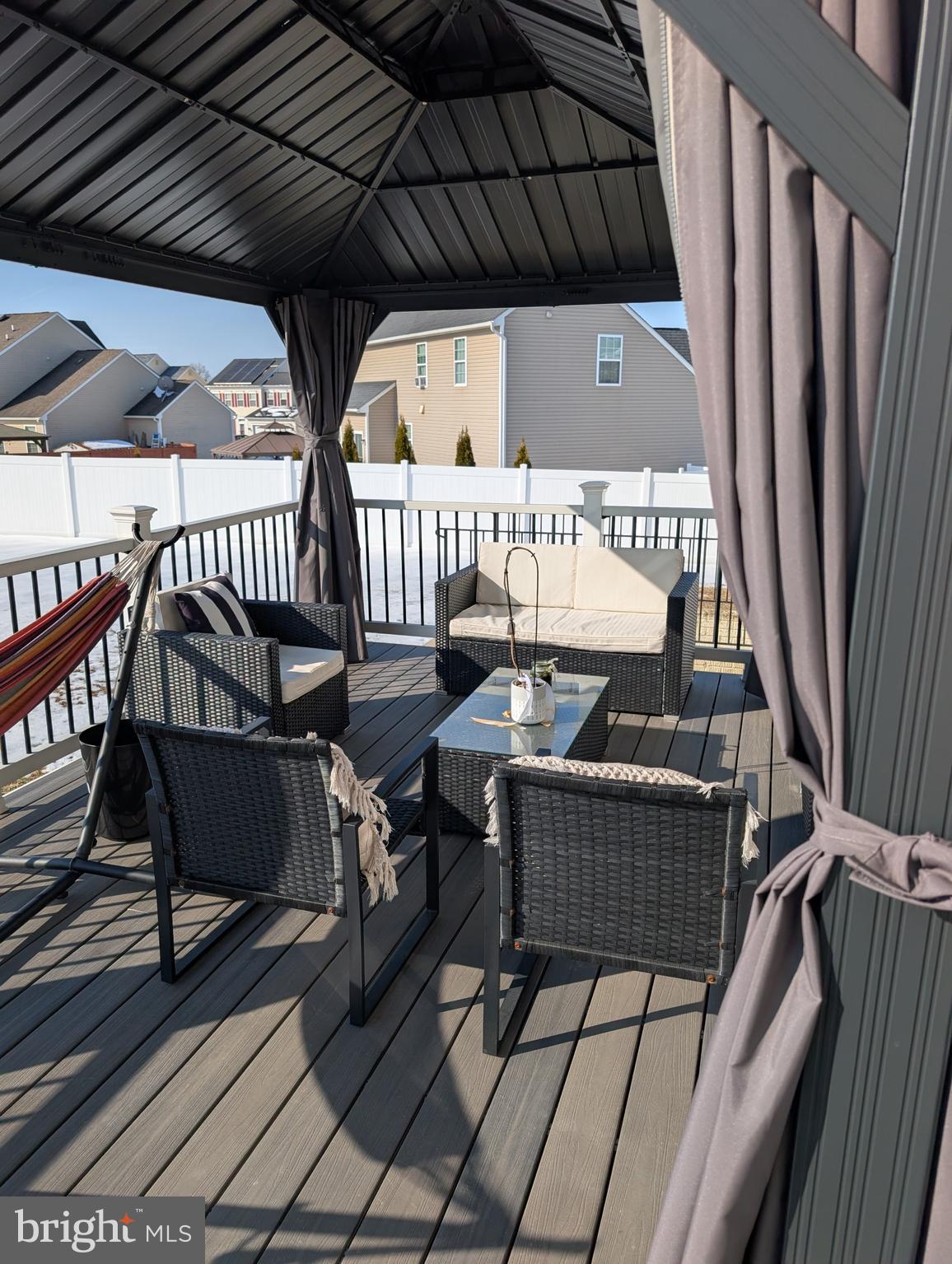 13944 Seneca Ridge Drive Hagerstown, MD 21740 - Photo 27 of 27 a roof deck with a table and chairs