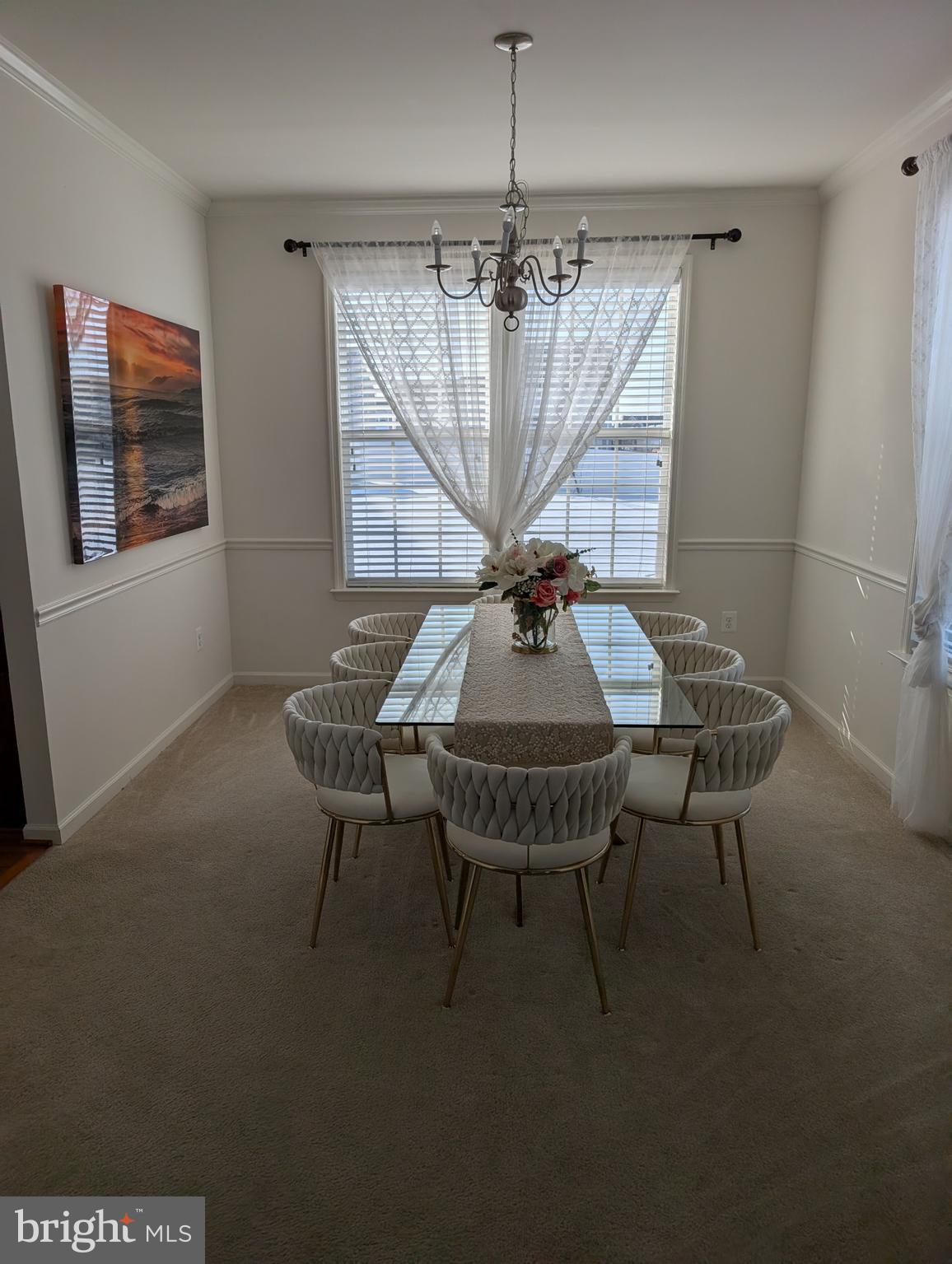 13944 Seneca Ridge Drive Hagerstown, MD 21740 - Photo 4 of 27 a view of a dining room with furniture and chandelier