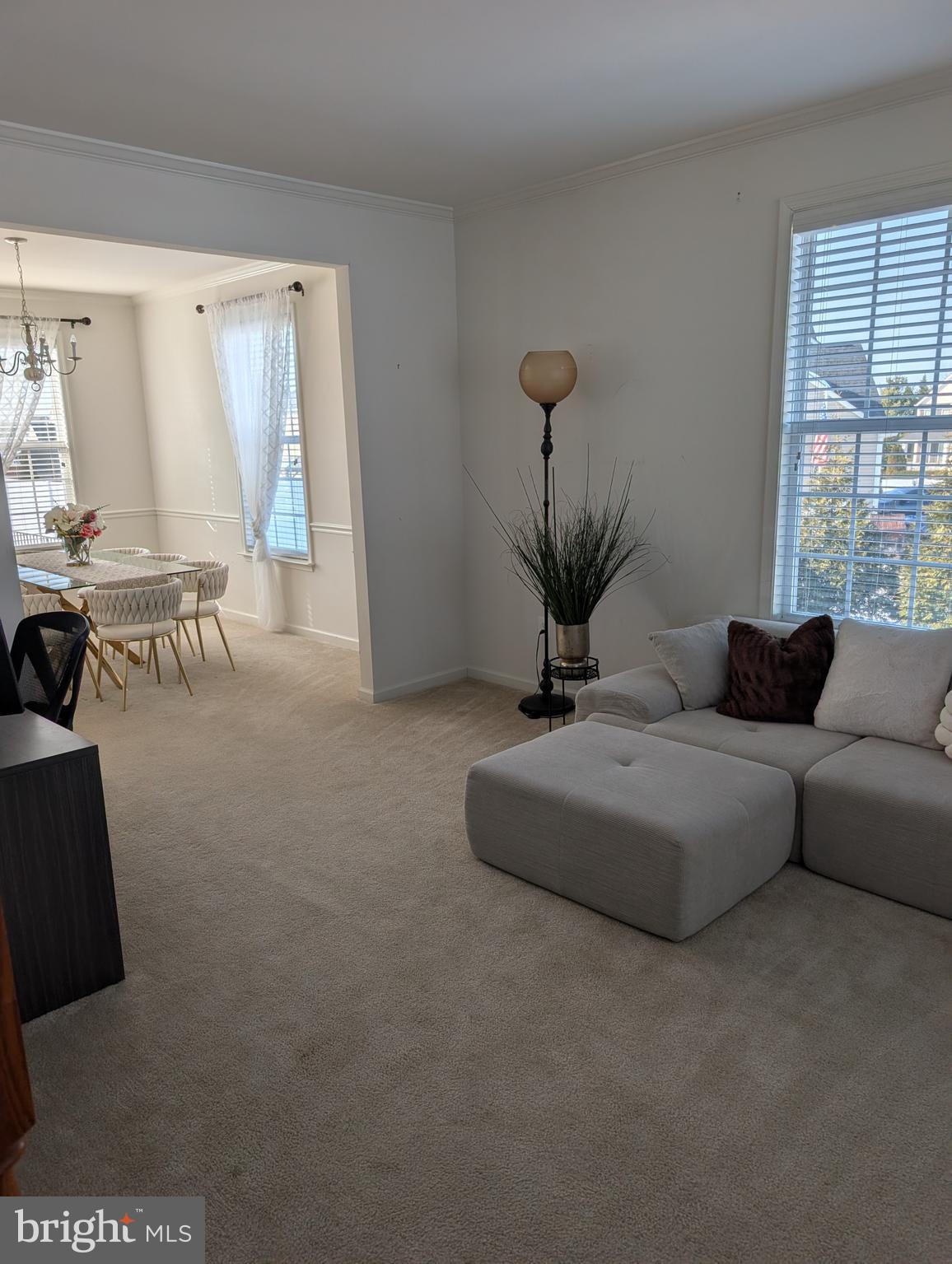 13944 Seneca Ridge Drive Hagerstown, MD 21740 - Photo 6 of 27 a living room with furniture a window and a table