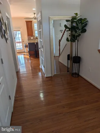 a view of entryway with wooden floor