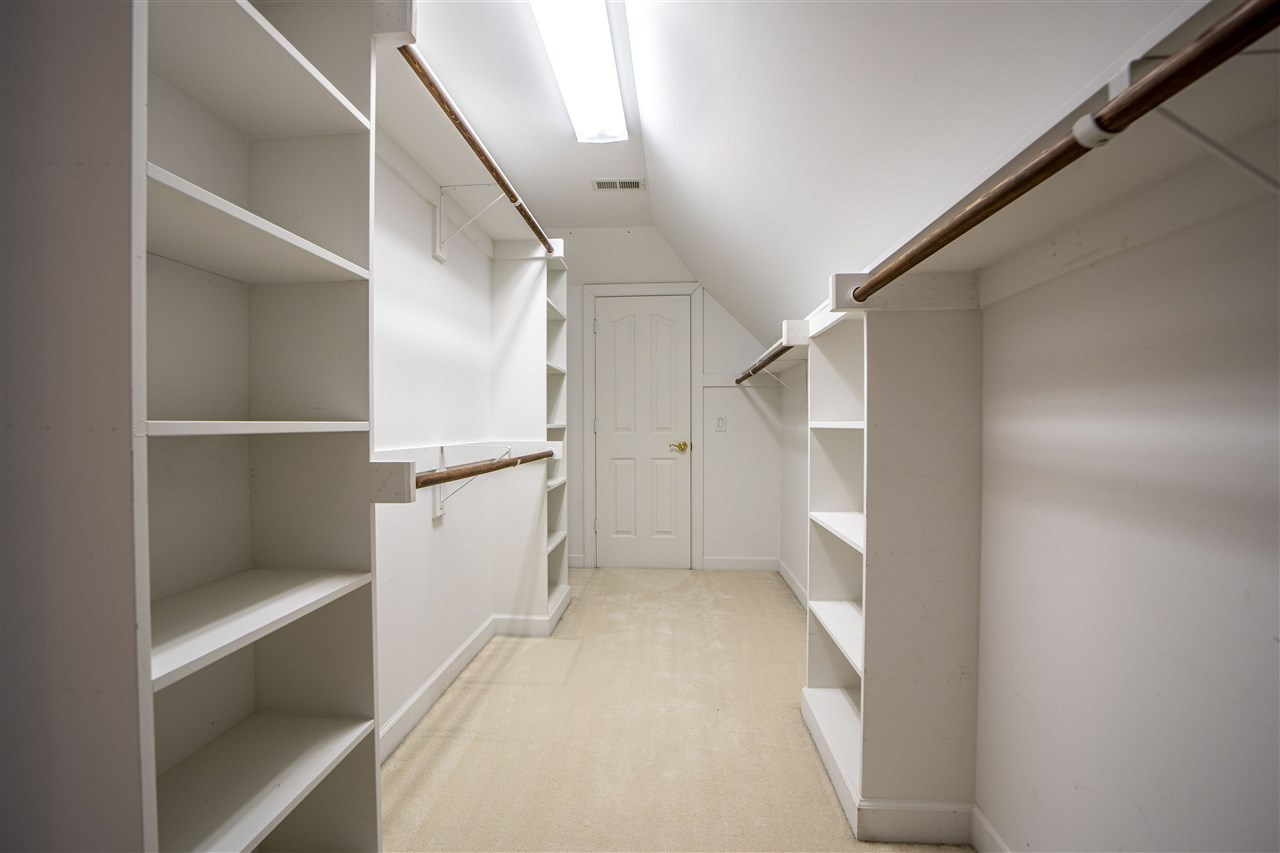6521 Brack Penny Road Raleigh, NC 27603 - Photo 20 of 30 This is off the bonus room. Great storage! Walk-in Closet