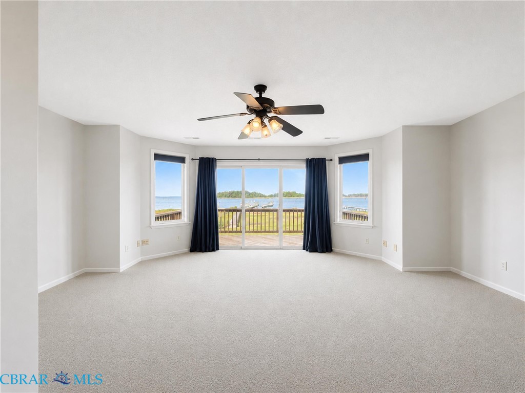 1214 Dandy Loop Road Yorktown, VA 23692 - Photo 46 of 65 a view of an empty room with a window