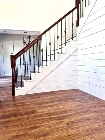 a view of entryway with wooden floor