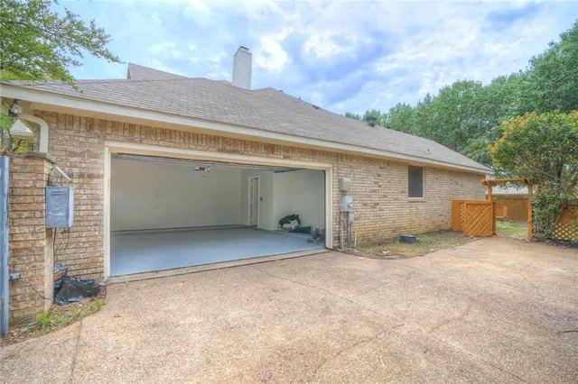 a view of a house with a garage