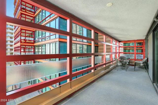 a bathroom with a double vanity sink mirror and toilet