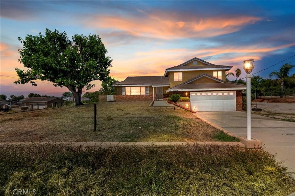 17504 Krameria Avenue Riverside, CA 92504 - Photo 1 of 1 a front view of a house with a yard
