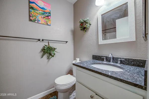 a bathroom with a bathtub and a shower curtain