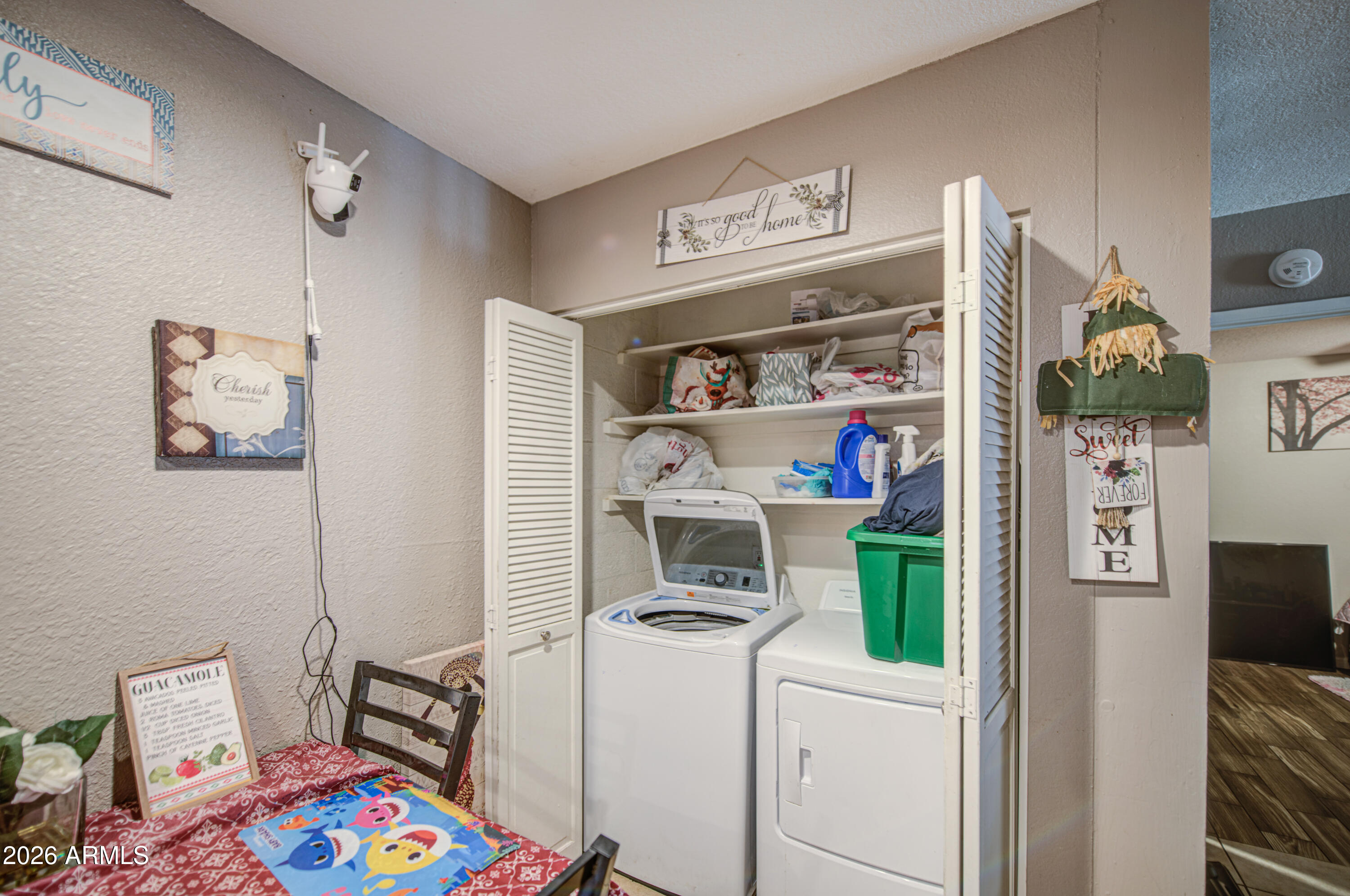 9009 West Elm Street, Unit 6 Phoenix, AZ 85037 - Photo 23 of 23 a room with storage and utility