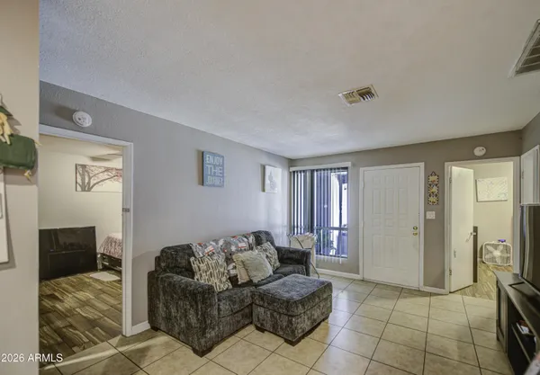 a living room with furniture and a couch
