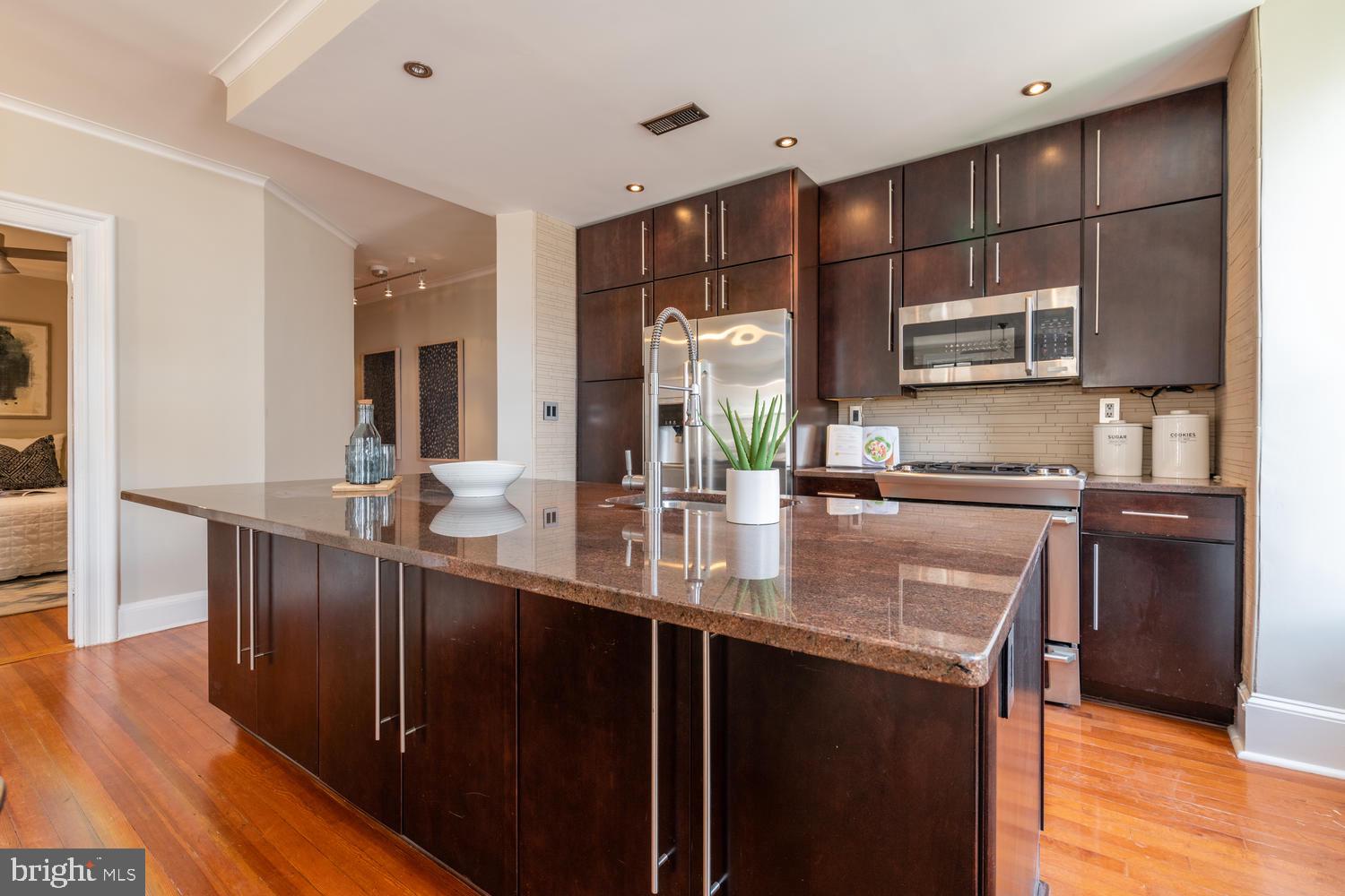 2022 Columbia Road Northwest, Unit 606 Washington, DC 20009 - Photo 15 of 52 Kitchen with space for bar stools.