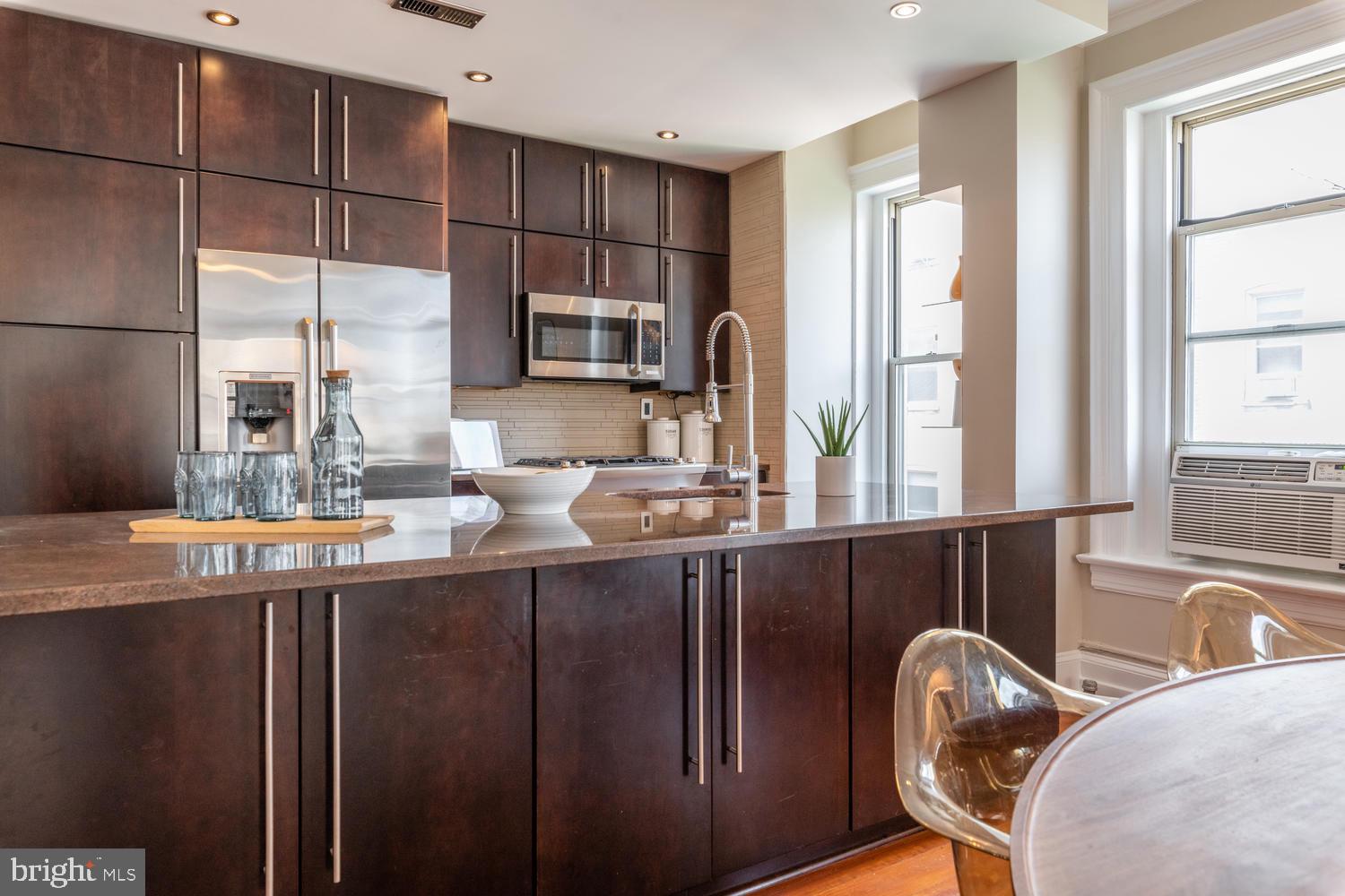 2022 Columbia Road Northwest, Unit 606 Washington, DC 20009 - Photo 16 of 52 Kitchen with extra storage in island.