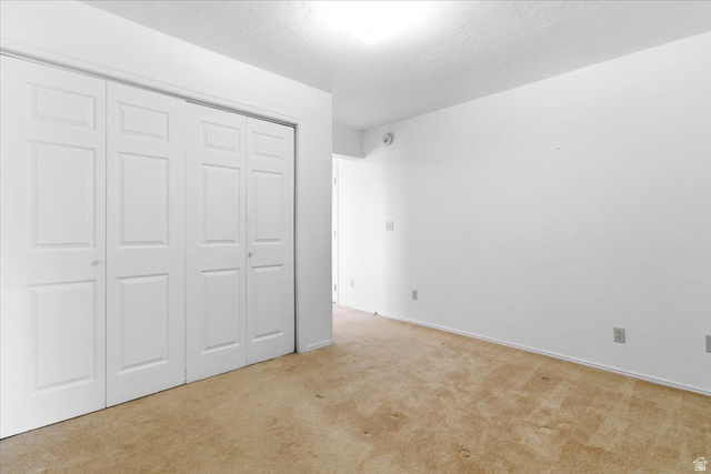 217 East 400 South Spring City, UT 84662 - Photo 28 of 71 Unfurnished bedroom with a closet and light colored carpet
