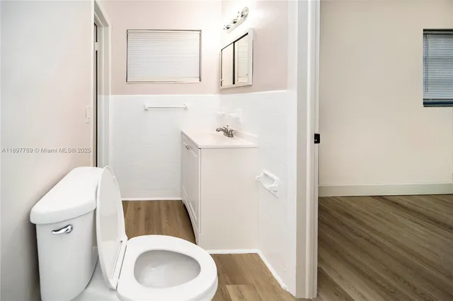 a bathroom with a sink and a toilet
