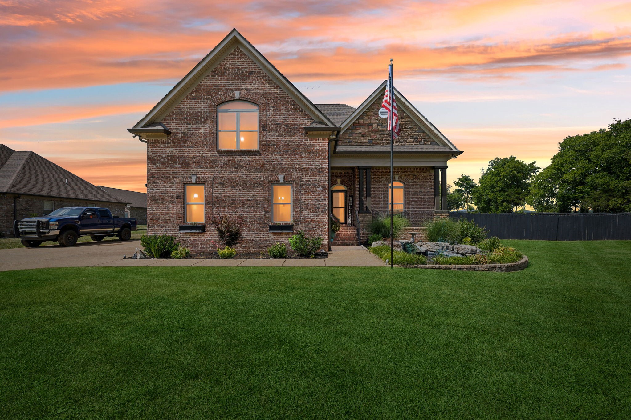101 Flat Woods Road Lebanon, TN 37090 - Photo 1 of 55 a front view of a house with a yard and garage