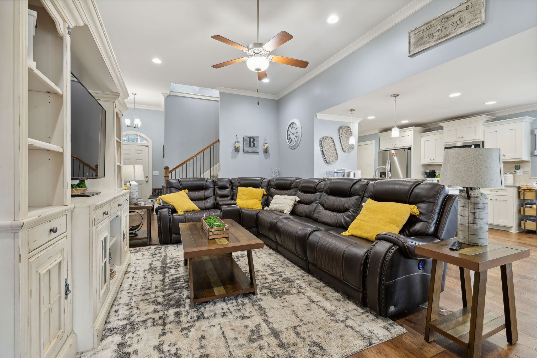 101 Flat Woods Road Lebanon, TN 37090 - Photo 15 of 55 a living room with furniture kitchen view and a chandelier